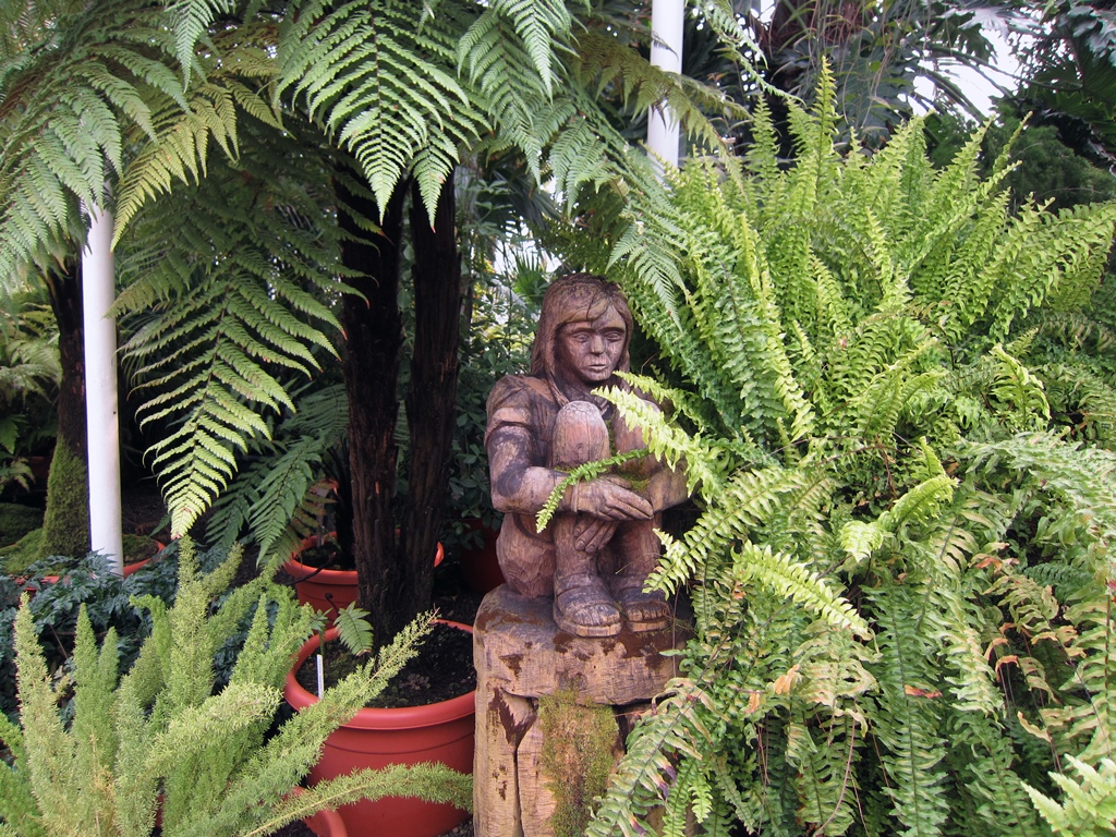 Wooden Sculpture Hiding in Plants